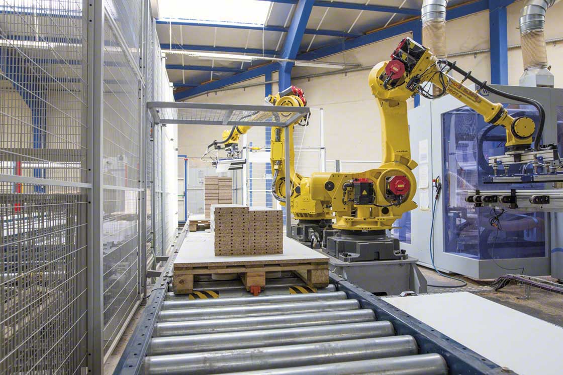 The anthropomorphic robot at the Euréquip warehouse sorts and stacks panels for furniture assembly