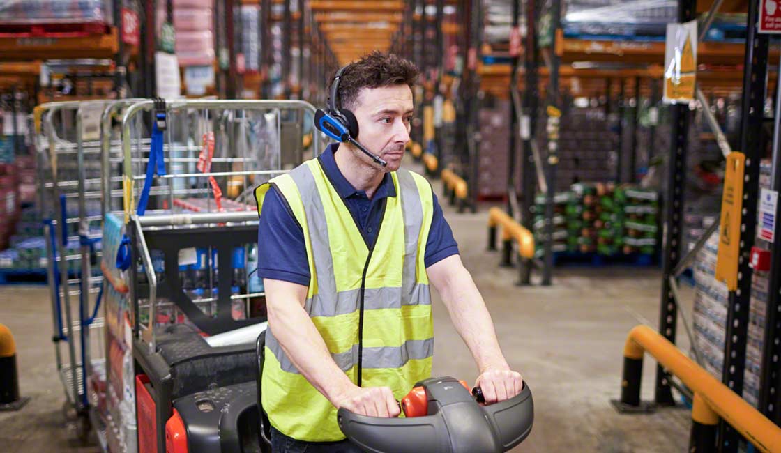 A warehouse picker can use picking assistance devices such as voice picking