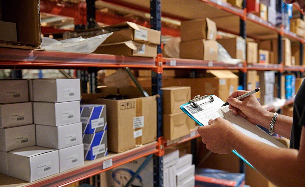 Operators collect SKUs off the shelving for picking
