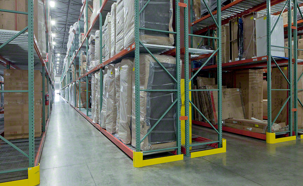 The pallet racks store various sizes of furniture