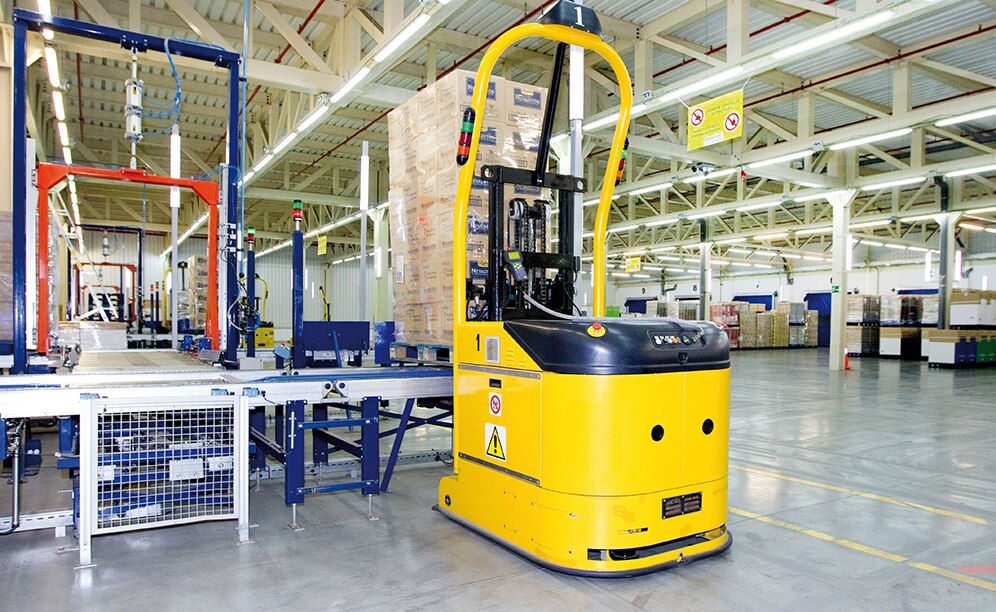 Laser guided forklifts (LGV) handle pallets leaving the warehouse Laser guided forklifts (LGV) handle pallets leaving the warehouse