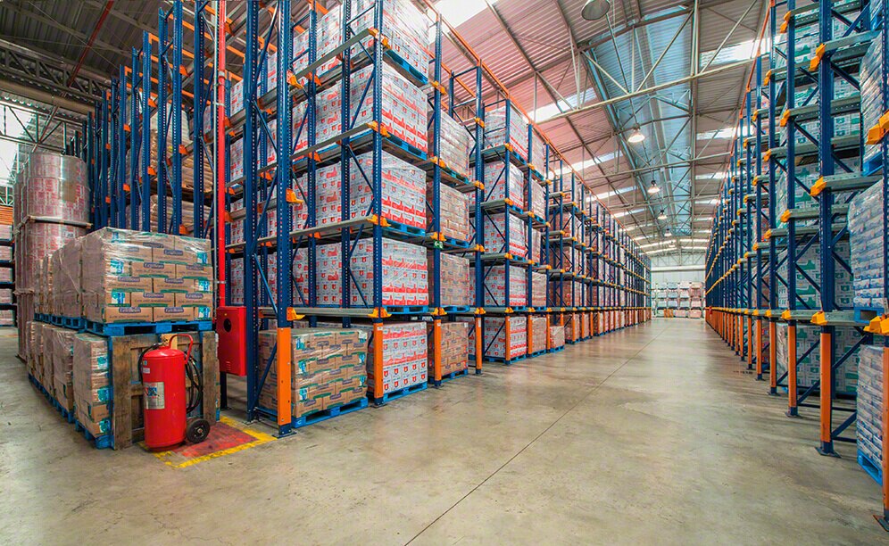 The three blocks of drive-in pallet racking occupy the greatest portion of the warehouse surface. Consumer products are housed herein, with a multitude of pallets per SKU