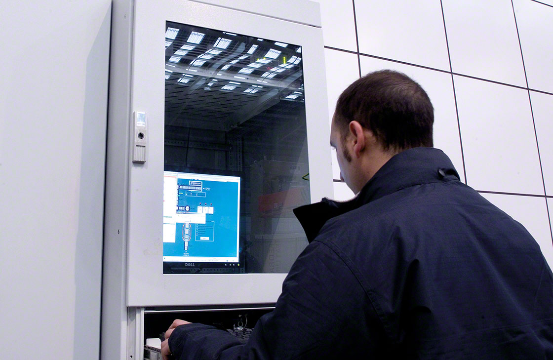 An operator checks the data log related to the tracking system
