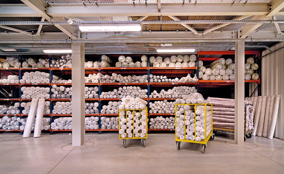 Aisles are wide enough to let operators move around with handcarts, picking and replenishing products Aisles are wide enough to let operators move around with handcarts, picking and replenishing products