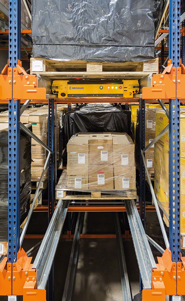 Pallet Shuttle operating inside one of the storage channels Pallet Shuttle operating inside one of the storage channels