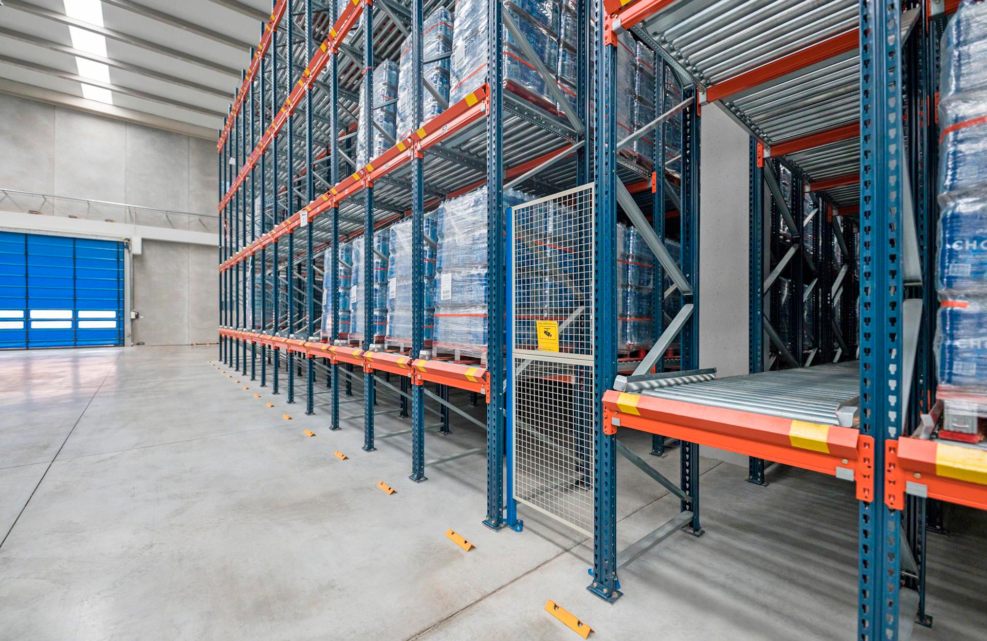 In pallet flow rack systems, passageways can be formed for repairs or maintenance work