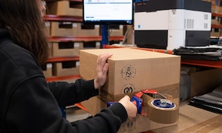 Packing in the warehouse consists of placing the different items of an order in a single container