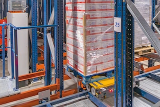 A 4-Way shuttle collects the pallet for storage