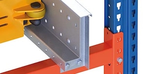 The rails are located inside the storage channels of the Automated Pallet Shuttle system