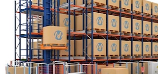 Elevators move pallets between the conveyor and the different racking levels