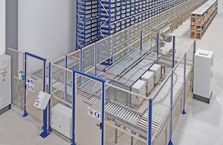 Safety enclosures mark off the carton conveyor’s path
