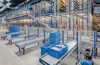 Conveyors are often used to interconnect the different floors of pick modules