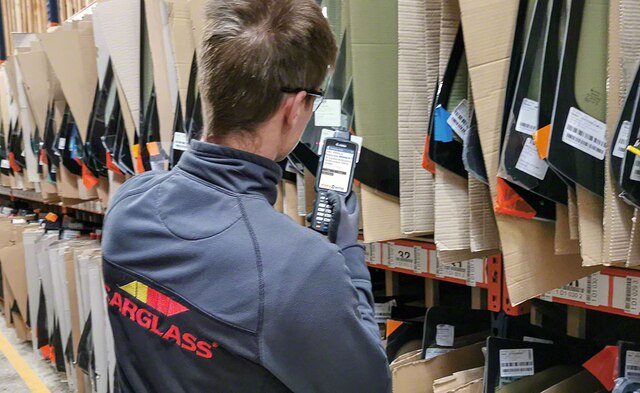 A Carglass operator follows instructions from Easy WMS A Carglass operator follows instructions from Easy WMS