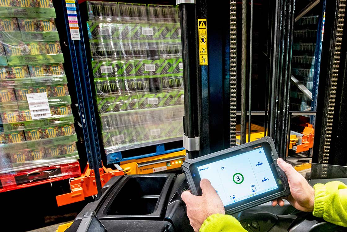 Operators use tablets to send instructions to the motorised shuttles Operators use tablets to send instructions to the motorised shuttles