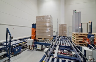 Full pallet stackers are used to raise unit loads and place them on slave pallets