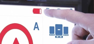 The low battery warning indicates whether to change or recharge the battery