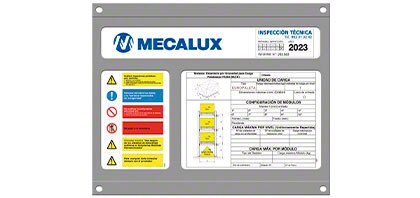 The safe load warning notice contains technical information on the push-back racking