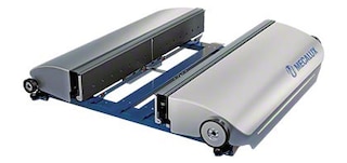 The shuttle vehicle stores and retrieves bins and trays from the racks
