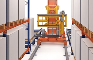 The trilateral forks pick pallets up at the end of the aisle