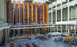 The storage space is totally automated, with 10 twin-mast stacker cranes