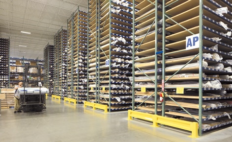 A special pallet racking solution sorts out the storage and handling of fabric rolls