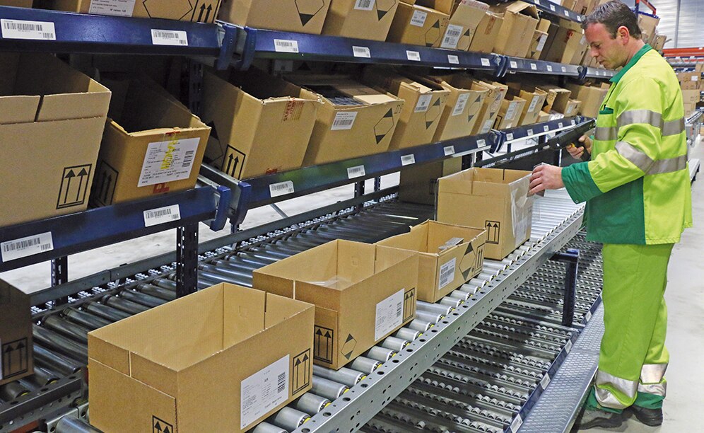 Live pallet racking for boxes (allocated to high turnover products) combined with conveyors